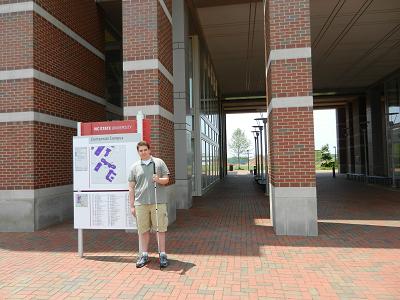 Picture of Sean Mealin standing in front of EB II, the Computer Science Department building