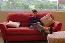 Marlies reading on the couch
